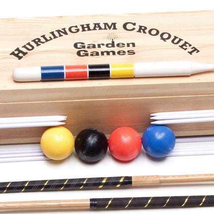 Hurlingham mallets with cylindrical brass bound heads and an inlaid sighting line